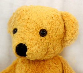 Kallisto music box - teddy bear - gold, organic cotton